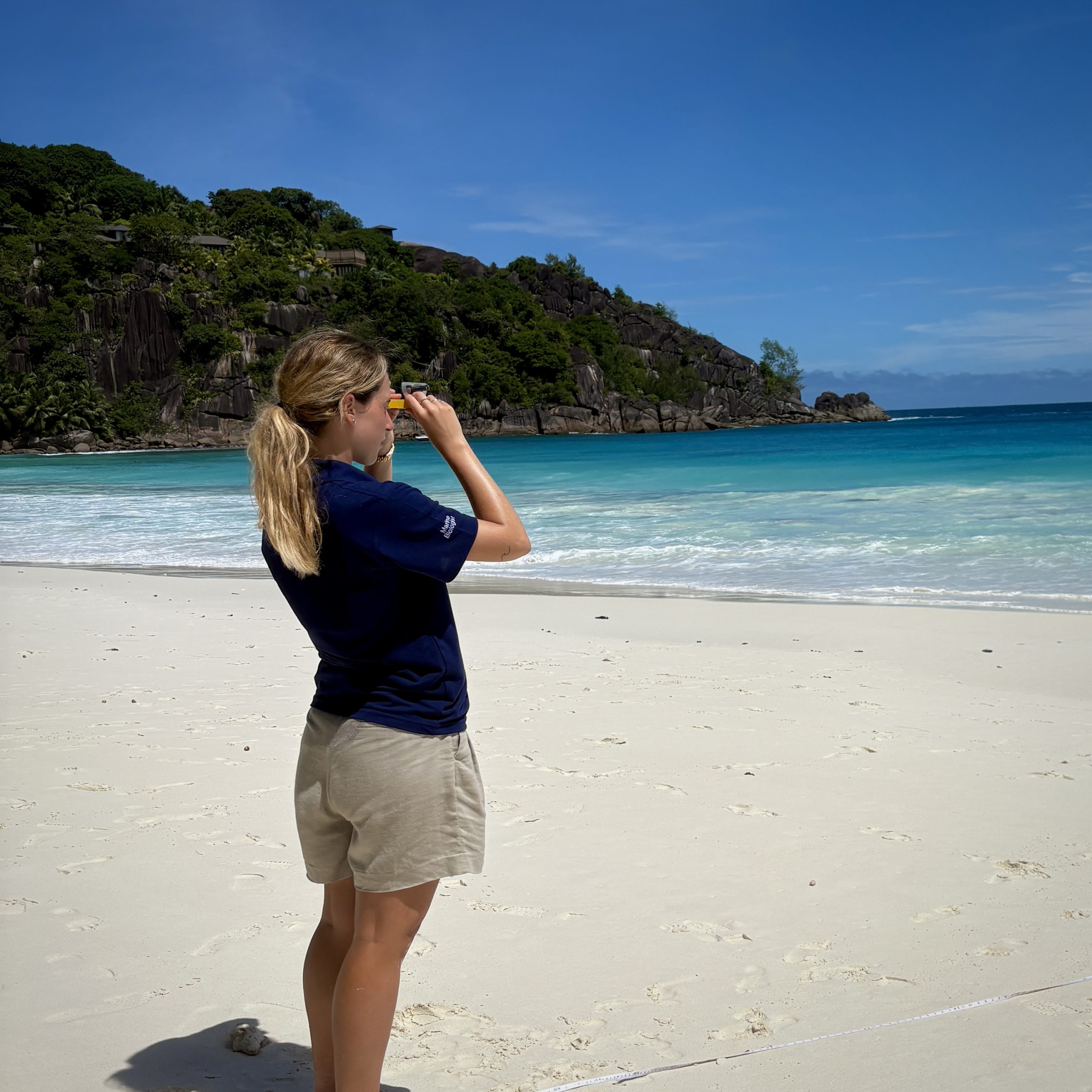 Ashley Harding carrying out a beach profiling survey