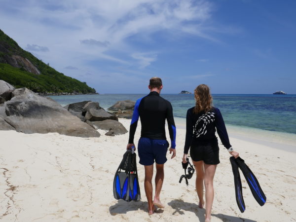 WiseOceans Marine Educator Vanessa with Guest getting ready to Snorkel at Club Med Seychelles